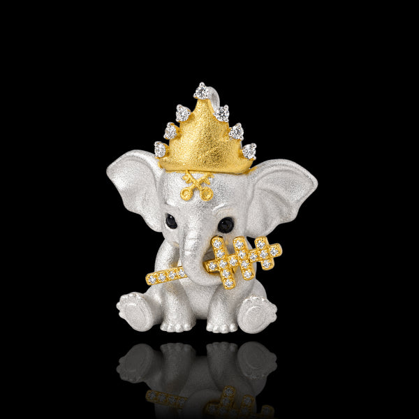 PurpleSea Hierophant Elephant Pendant, sterling silver elephant pendant with a gold crown, blue stone eyes and ornate gold details, front product view on a black background