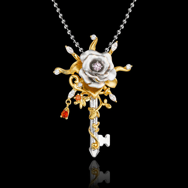 PurpleSea Hierophant Rose Pendant, sterling silver rose pendant with gold rays, red accents and a dangling key-like detail, front view hanging on a chain against a black background