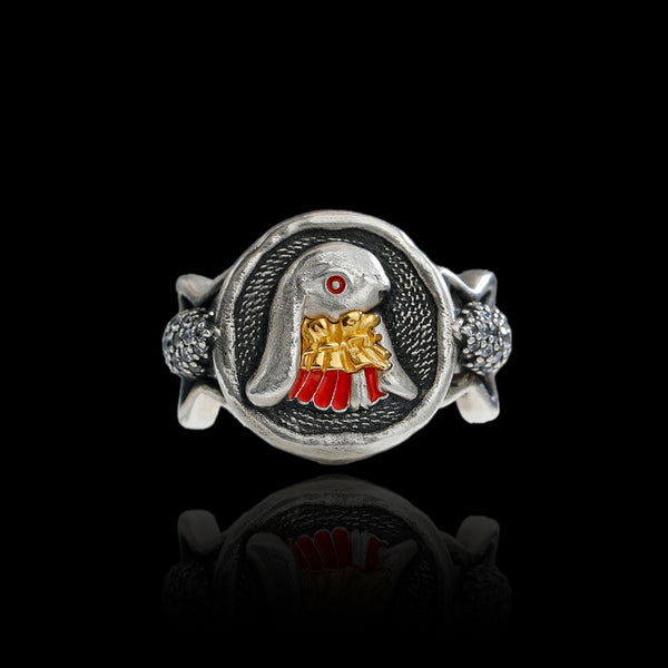 PurpleSea Travel Rabbit Ring, sterling silver ring with a rabbit figure in red clothing framed inside a round travel-inspired setting, front product view on a black background